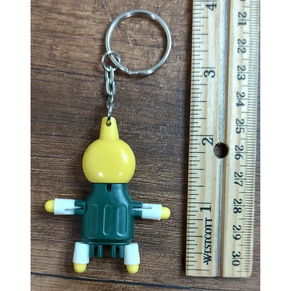 SMOKEBUDDY Keychain Green Plastic Smoke Buddy Poseable Happy Smiley Face B16